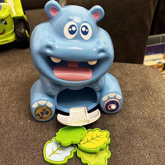 Happy Kids Toy Co Happy Cookie Eating Hippo - English & Spanish - Picture 1 of 2